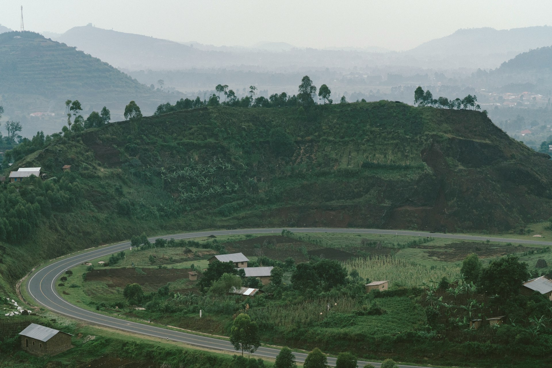 Uganda green mountain road scenery
